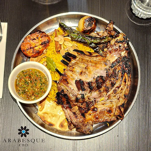 Zarb, a full rack of Bedouin-style lamb over spiced rice
